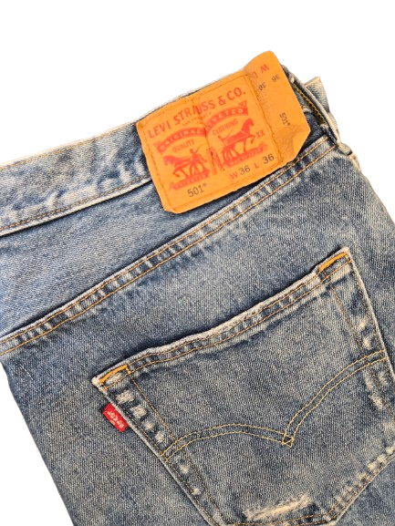 Levis 501 ripped jeans
